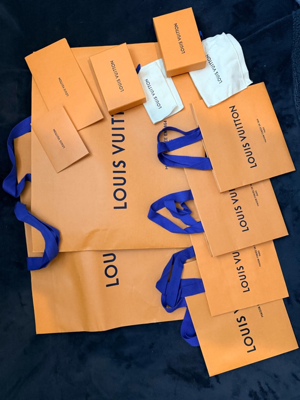 Authentic Louis Vuitton Orange Shopping Bags and Gift Boxes with Blue Ribbons